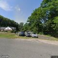 Confused male driver lost near Hollow Road in Woodbury
