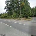 Erratic blue SUV driving on WA-302 near Danforth