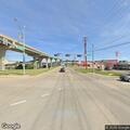 Disabled pickup truck on highway exit ramp