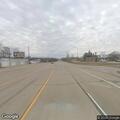 Debris and traffic barrels blocking lane on I-90