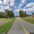 Lumber blocking roadway on Merle Travis Highway