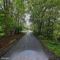 Garbage truck dumps load on Cleveland Road