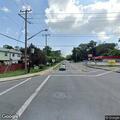Person lying unconscious near Graham Park Rd bus stop