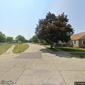 Loose black dog reported near 57th Street
