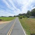 Officer transporting man to Hinshaw Country Road