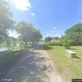 Elderly woman found face down in lake remains in cardiac arrest