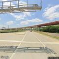 Smoke reported under bridge near railroad tracks