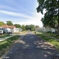 Person reported sitting by backyard fire