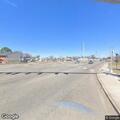 Car leaves road and stops on railroad tracks