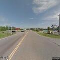 Disabled vehicle near roundabout on County Road 77