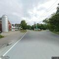 Car hits pole on Main Street, two people injured