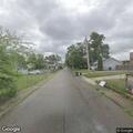 Neighbor reports man running into Adams Street home