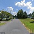 Person experiencing abdominal pain at Hatboro road intersection