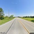 Traffic stop on silver car with windows down