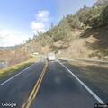Traffic hazard involving red pickup on Highway 299