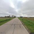 Wagon and tractor blocking road near Road 4 in McCool Junction