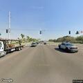 Crash involving red motorcycle at mall intersection