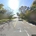 Illegally parked school buses block traffic view