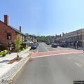 Report of man on bicycle looking in windows