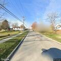 Tree limbs blocking road near elementary school