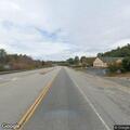 Debris reported in road on Route 11 near garage