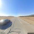 Stalled van on I-90 shoulder near milepost 40