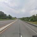 Smoke reported in wooded area near highway exit