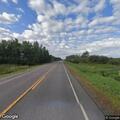 Tree blocking lane on Highway 65 near Swan River