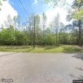 Tree blocking roadway at Stokes Lane and Herron Road