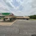 Person experiencing chest pain at Sinclair gas station