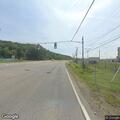 Man walking in middle of road on New Goff Mountain