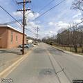 Traffic stop on burgundy Nissan SUV