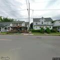 Person yelling and running into traffic on Main St