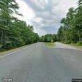 Motorcycle and bear crash on Route 122