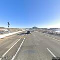 Traffic hazard with white van on I-25 south ramp