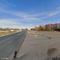 Boat trailer with flat tire off highway near Milltown