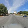 Two-vehicle crash with oil leak on Central Street