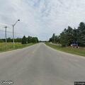 Two-vehicle crash with injured driver in ditch