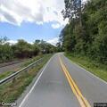 Mulch and metal debris reported on roadway