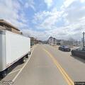People sitting in bus lane create traffic hazard