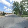 Officer checks blue Dodge on Elm Street