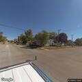 Dirt bike speeding and doing wheelies in neighborhood