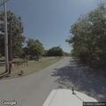 Suspicious man on utility pole with ladder