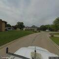 Traffic stop on white GMC utility vehicle