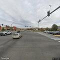 Disabled car with missing tire at Sparks intersection