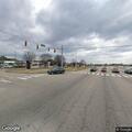 Person walking in and out of traffic on Capital