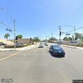 Woman clutching chest feels faint at street intersection