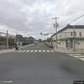 Person experiencing alcohol withdrawal at city intersection