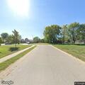 Large tree blocking Monroe Street in Raymore