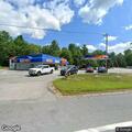 Employee reports man loitering outside business